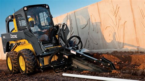 cutting ditch with skid steer|john deere digging a ditch.